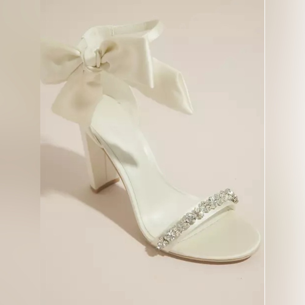 WOW! Beautiful white bow/crystal 4” heels- almost new. 1 hour old :)
